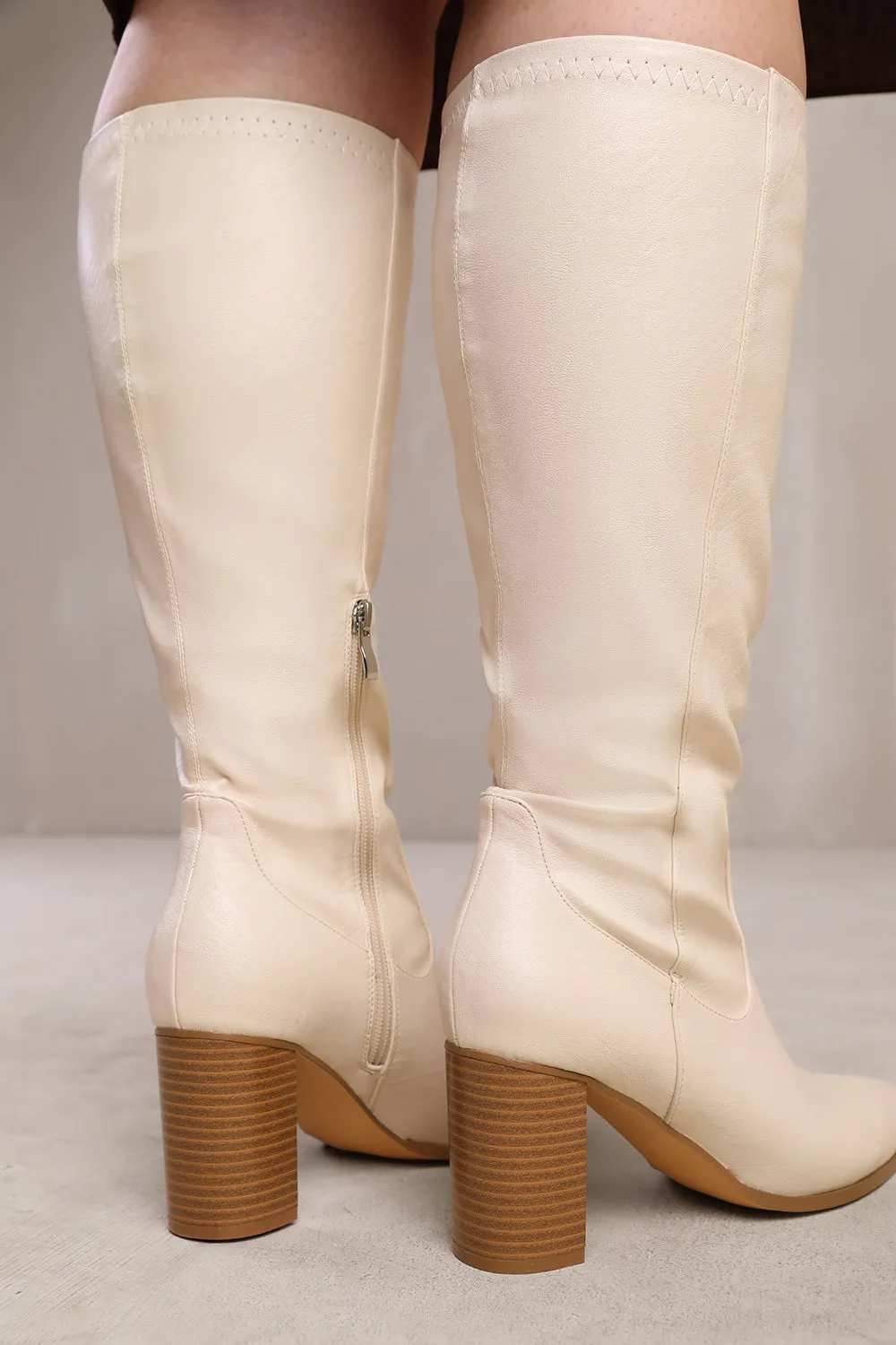 HAWTHORN STRETCH WIDE CALF BLOCK HEEL KNEE HIGH BOOTS WITH STITCH DETAIL IN WIDE E FIT IN CREAM FAUX LEATHER