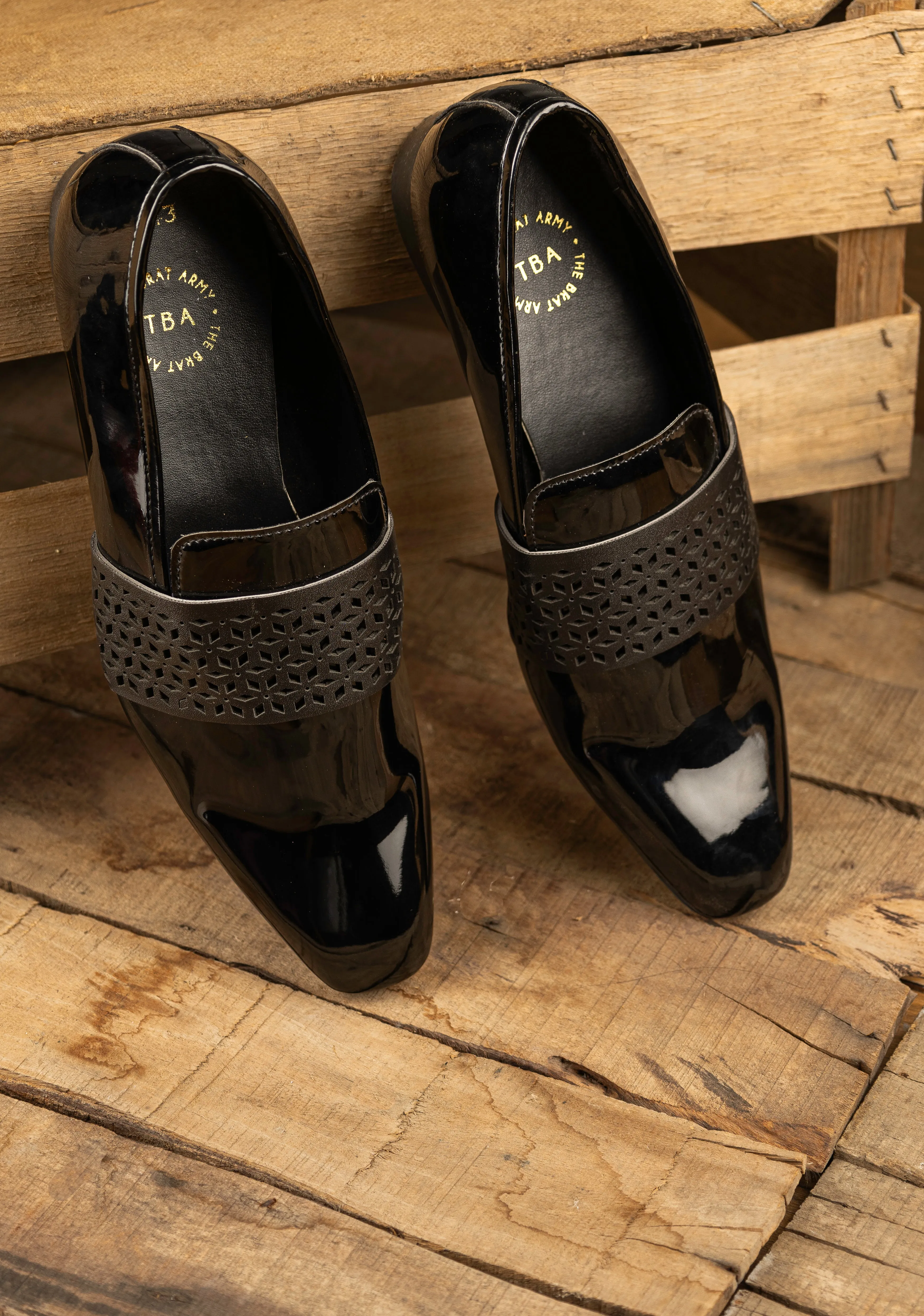 Montreux Patent Black Carved Strap Loafers.